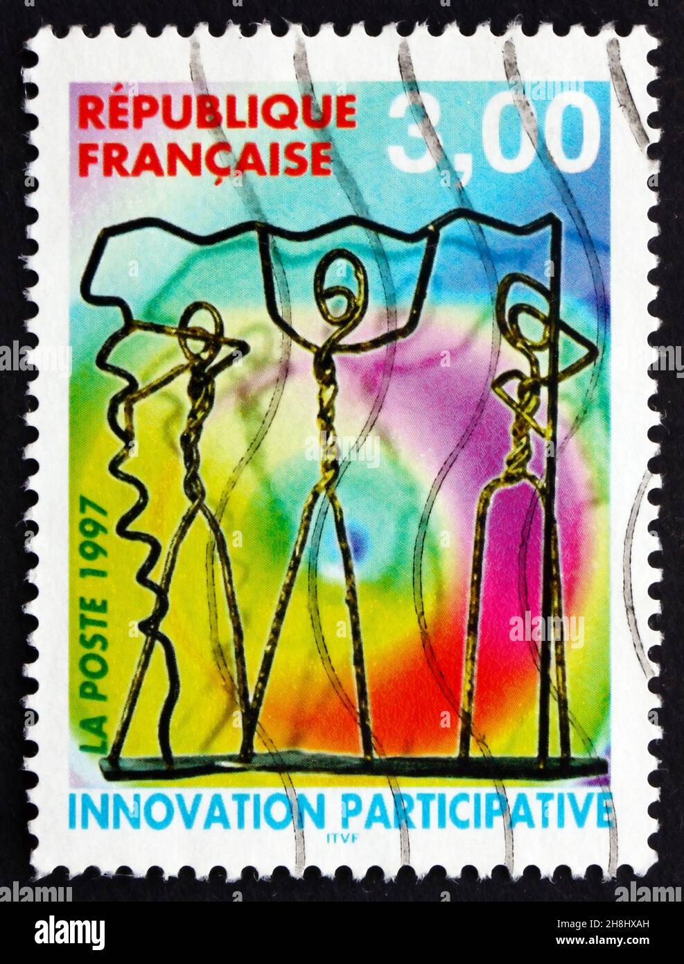 FRANCIA - ALREDEDOR de 1997: Un sello impreso en Francia muestra Inovación Participativa, Caracteres de Alambre, alrededor de 1997 Foto de stock