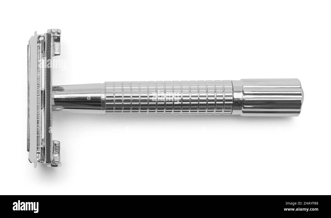 Corte de vista superior de la afeitadora metálica en blanco. Foto de stock
