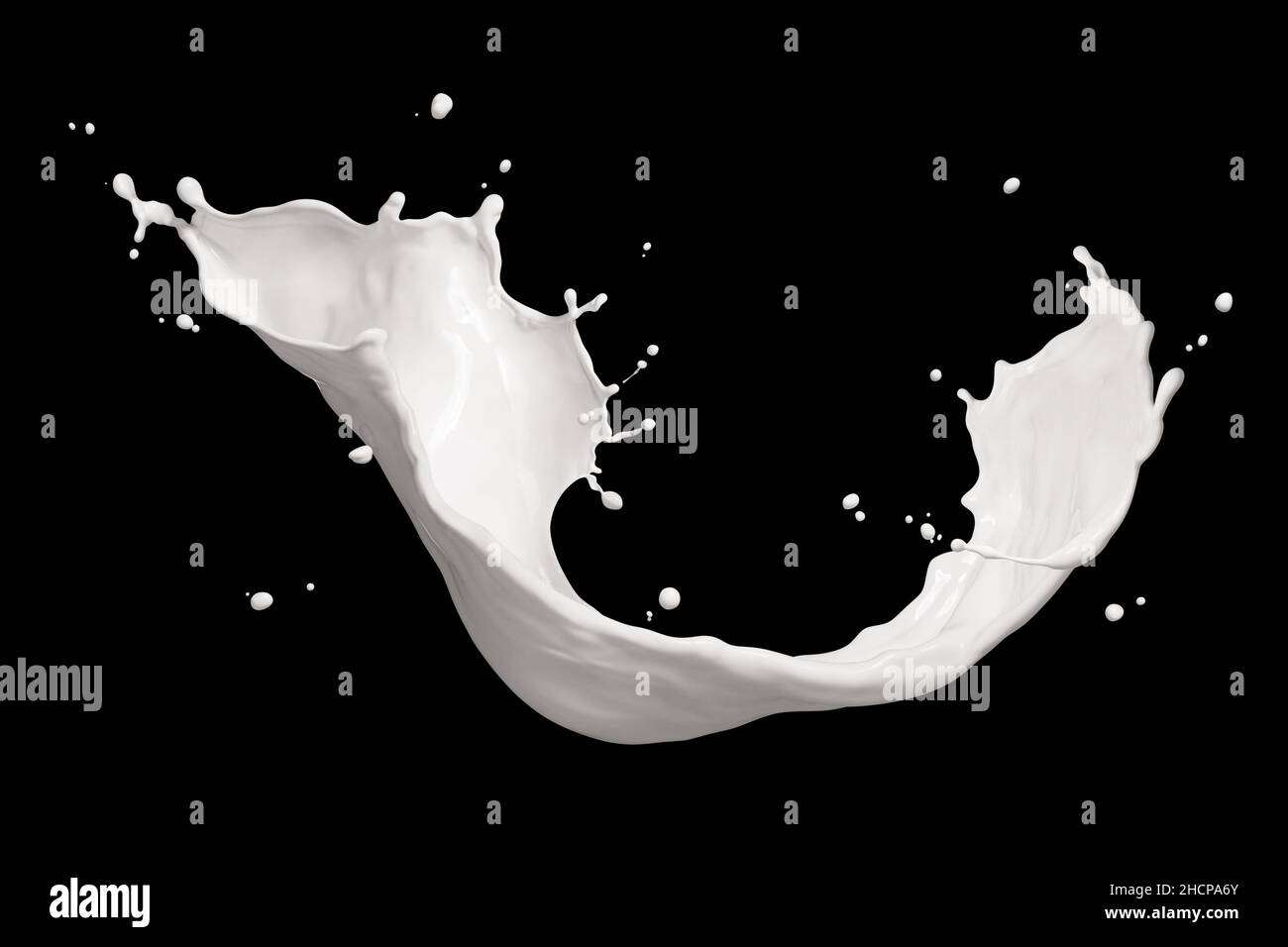 Salpicaduras de leche aislado sobre fondo negro Foto de stock