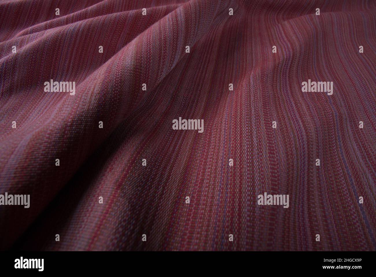 Primer plano de textura de tela de algodón tejida a mano, algodón tailandés de color natural teñido Foto de stock