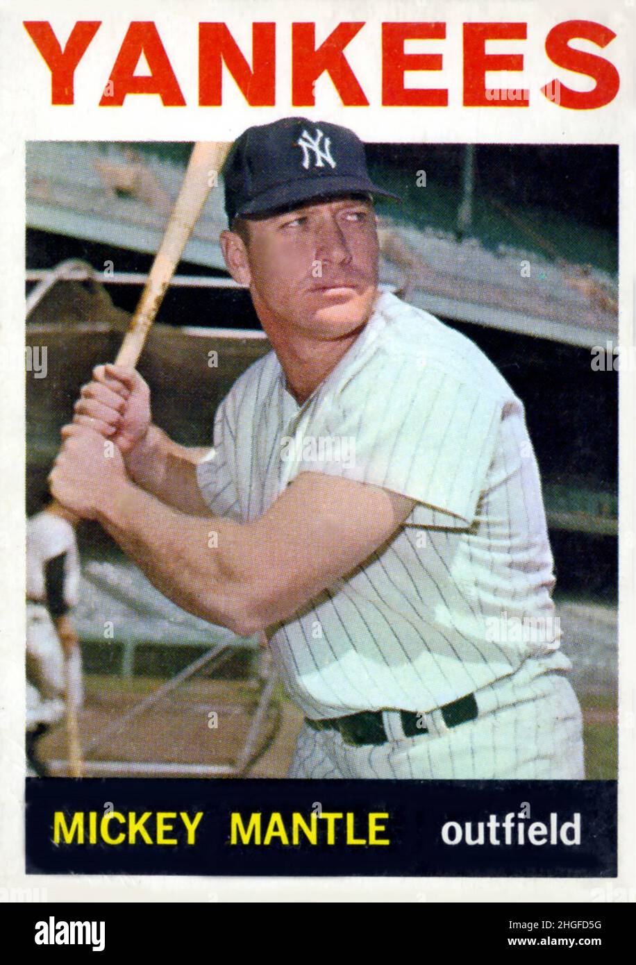 Una tarjeta de béisbol de 1964 Topps que representa al jugador del Salón de la Fama Mickey Mantle con los Yankees de Nueva York. Foto de stock