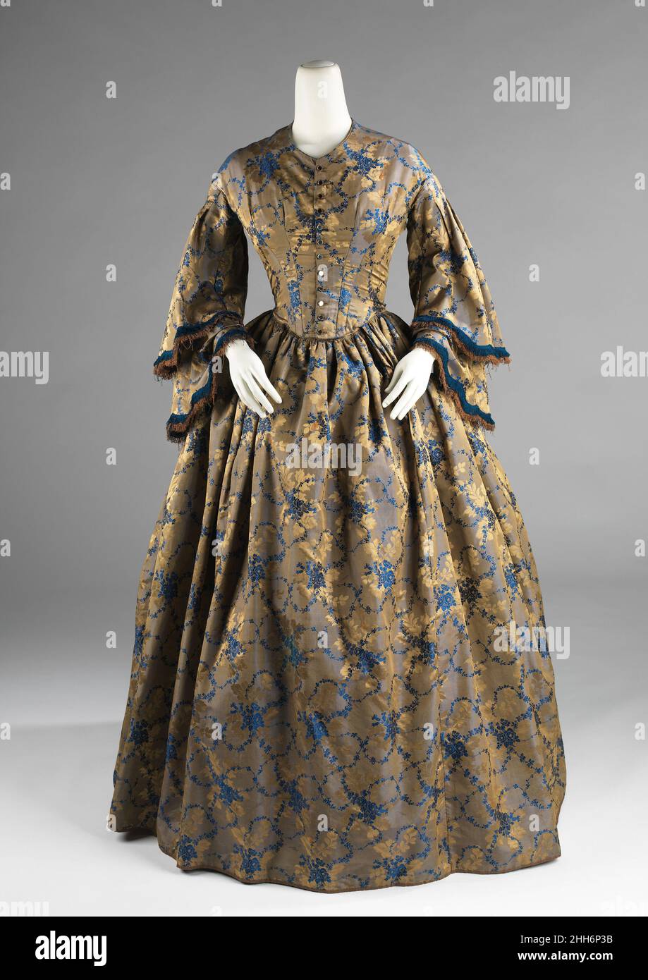 Vestido de la tarde 1850–55 Americano La silueta femenina de mediados del  siglo 19th consistía en un corsé ajustado y amplias faldas completas. Las  faldas cónicas se desarrollaron entre los 1830s, cuando
