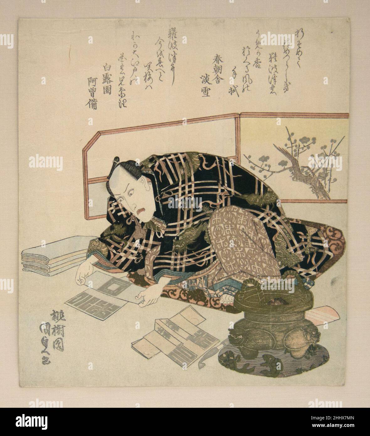 Ichikawa Danjūrō VII Preparación de los regalos de Año Nuevo ca. 1830  Utagawa Kunisada Japanese El actor Kabuki Ichikawa Danjūrō VII se muestra  en casa, vestido de día, no en traje Kabuki,