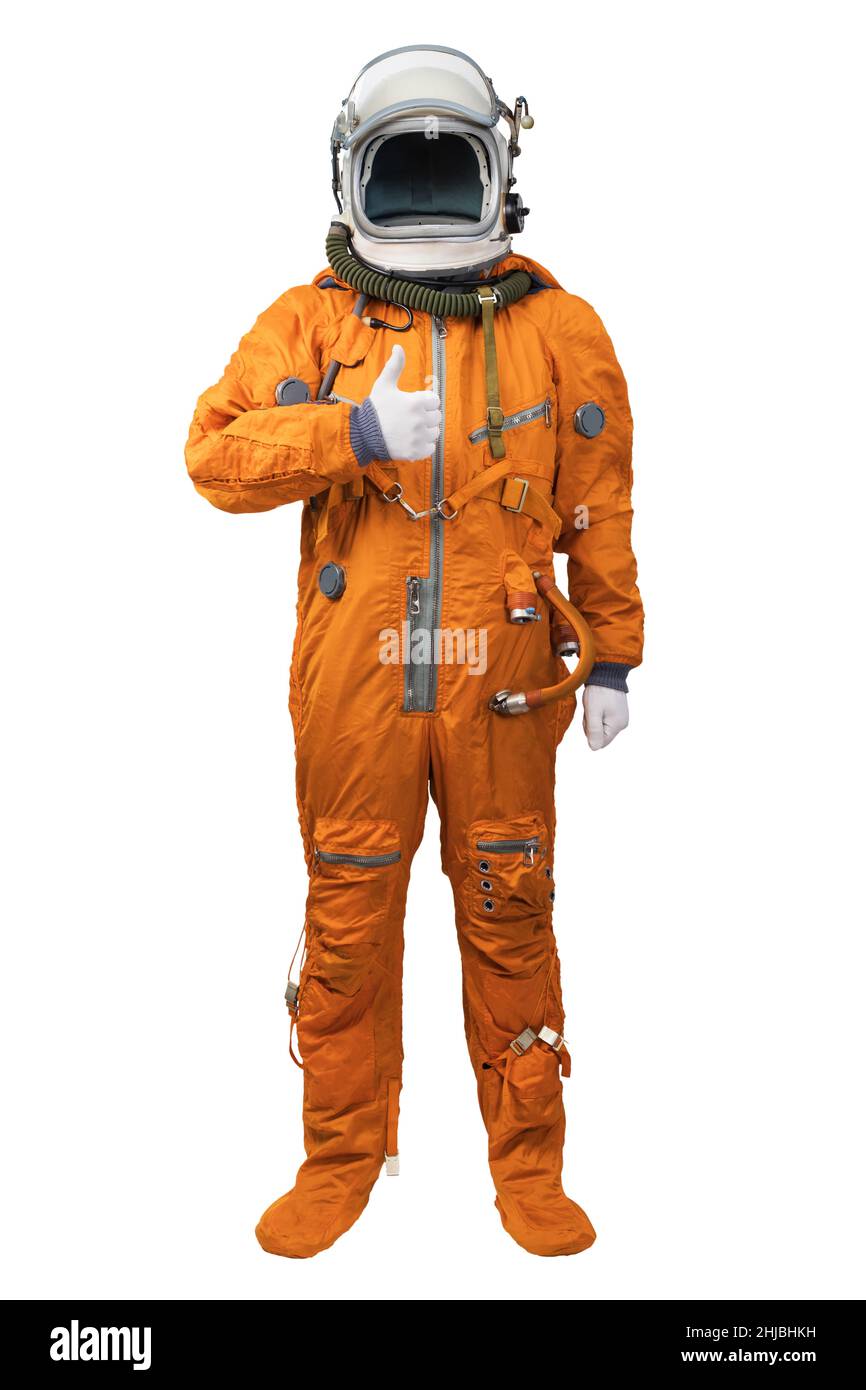 Astronauta con un traje espacial naranja y un casco que muestra un gesto de  pulgares hacia arriba aislado sobre fondo blanco Fotografía de stock - Alamy