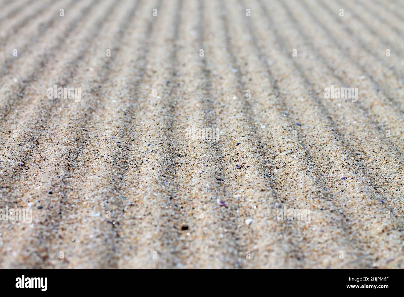 Textura de arena ondulada para el fondo. Foto de stock