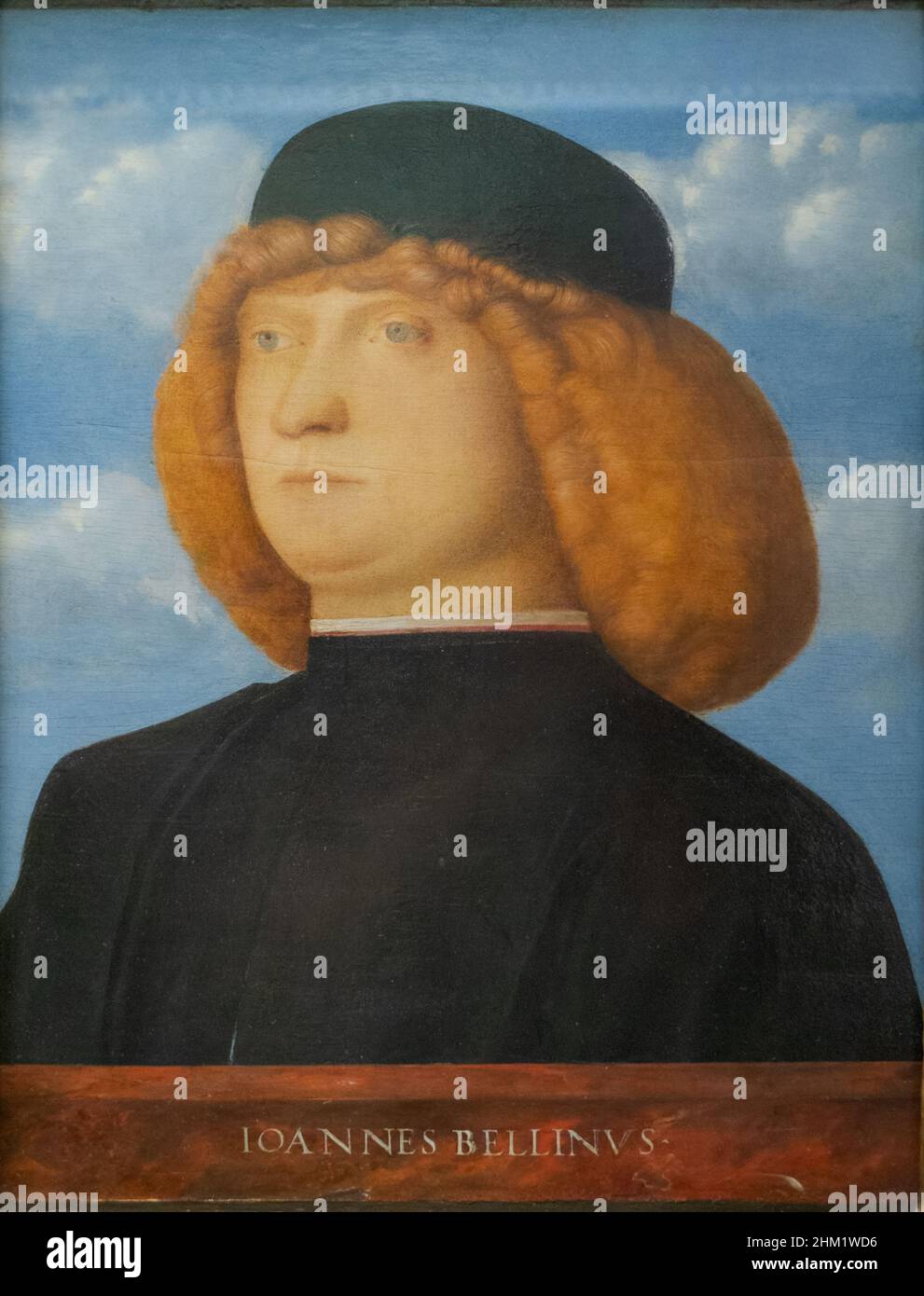 Atribuido a Giovanni Bellini; Venecia, 1433-1510, Retrato del joven , 1500, óleo sobre panel de madera, Galerías Uffizi, Florencia, Italia Foto de stock