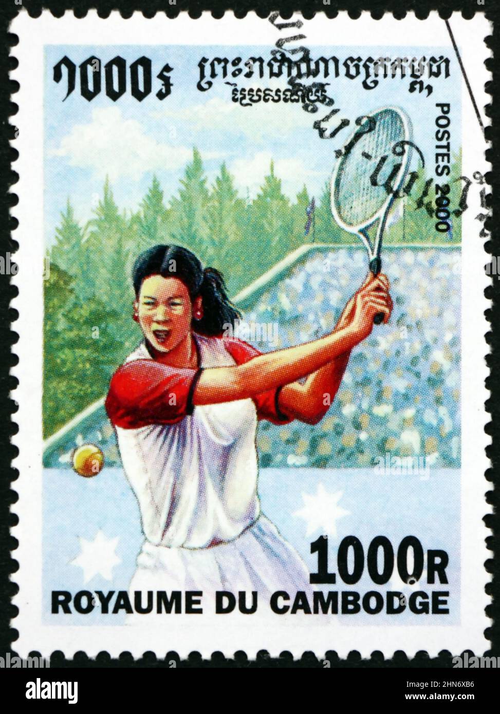 CAMBOYA - ALREDEDOR de 2000: Un sello impreso en Camboya muestra mujeres tenis, deporte, alrededor de 2000 Foto de stock