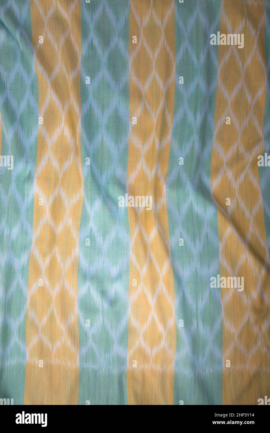 Textura de tela de algodón tejida a mano, algodón tailandés de color natural teñido Foto de stock