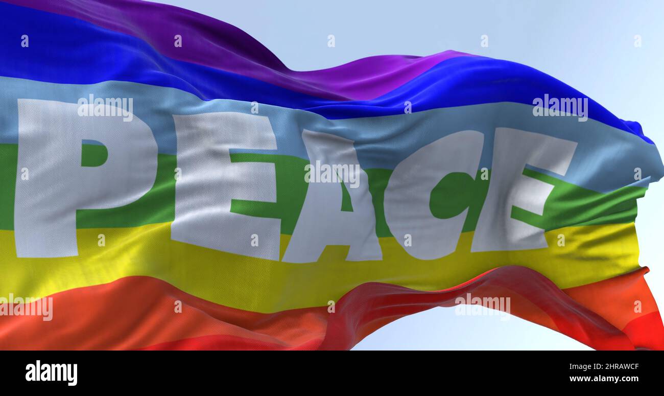 la bandera arco iris de la paz volando en el viento. Ningún movimiento de guerra Foto de stock