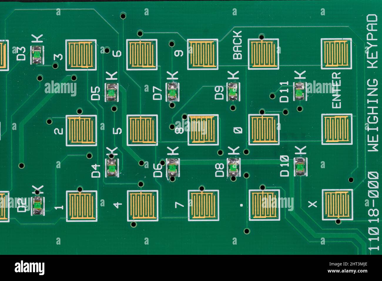 Primer plano una placa de circuito impreso del teclado desde una pequeña unidad de ordenador dedicada utilizada en equipos de pesaje Fotografía stock - Alamy