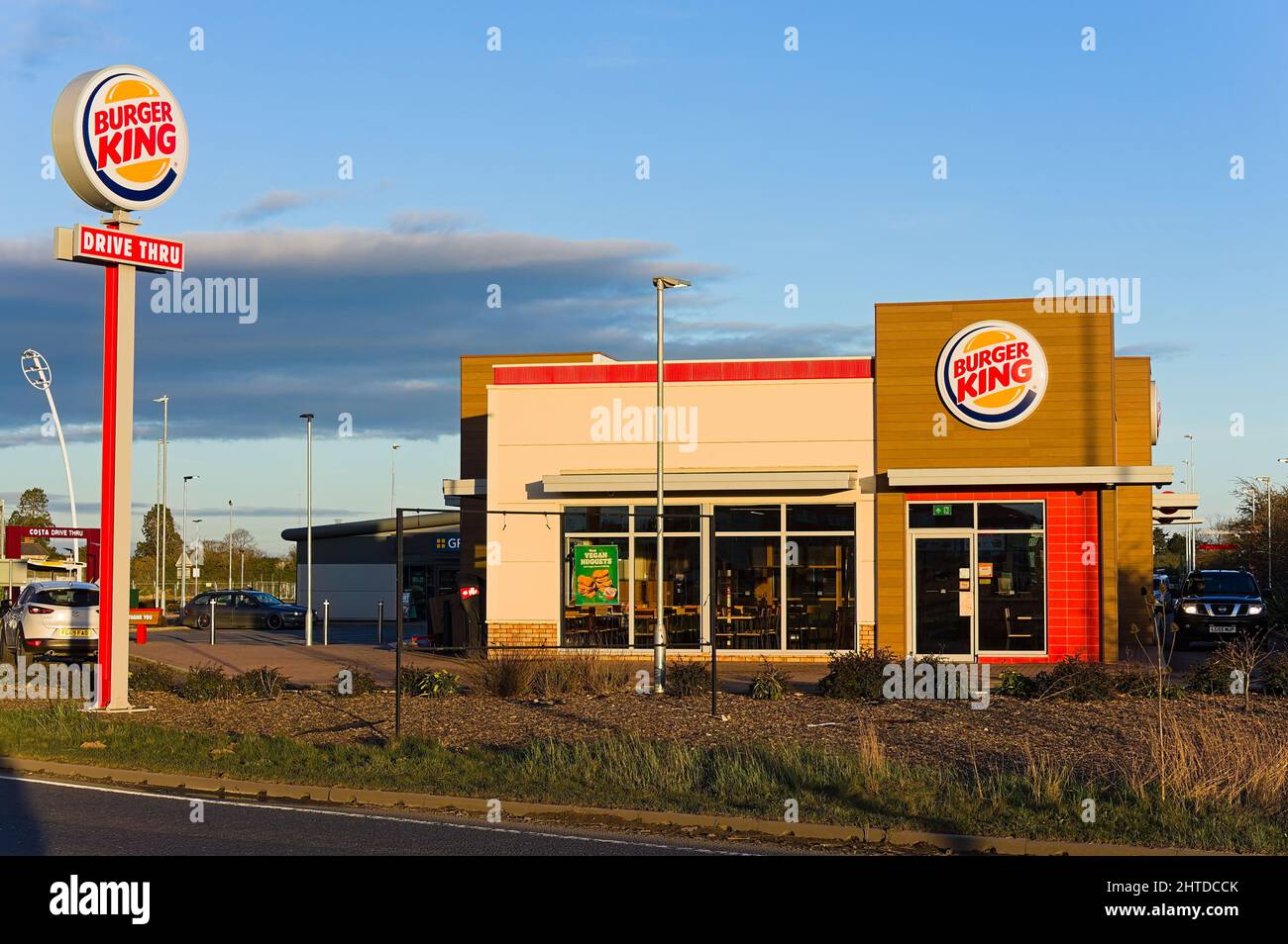 Un outlet de Burger King y un cartel en el cuadrante de desarrollo en  Sundown Fotografía de stock - Alamy
