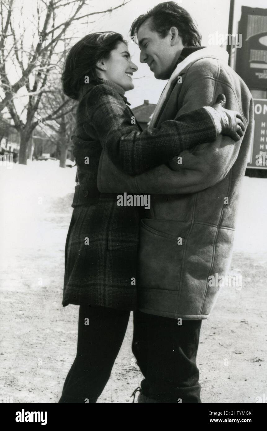 El actor Nicholas Cage y Madchen Amick en la película atrapados en el paraíso, EE.UU. 1994 Foto de stock