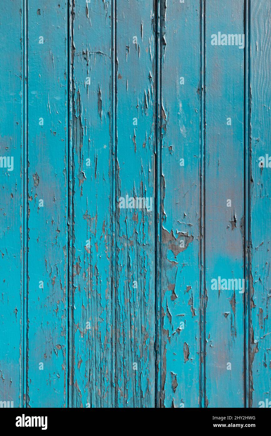 La pintura azul se descascara de una textura de la superficie vieja de  madera Fotografía de stock - Alamy