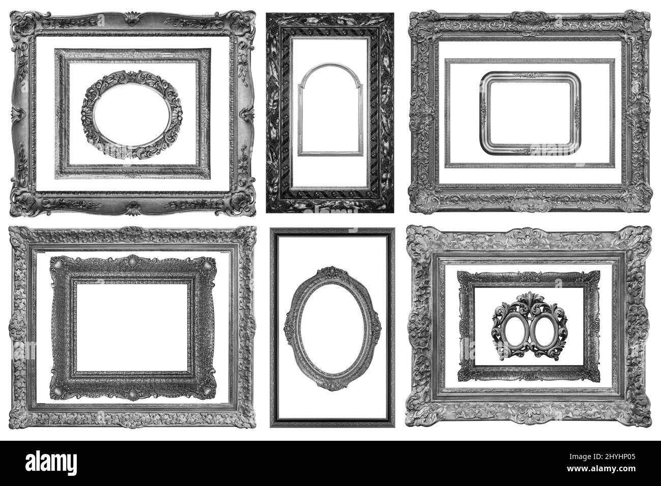 Conjunto de varios marcos decorativos de madera chapados en plata aislados sobre fondo blanco Foto de stock