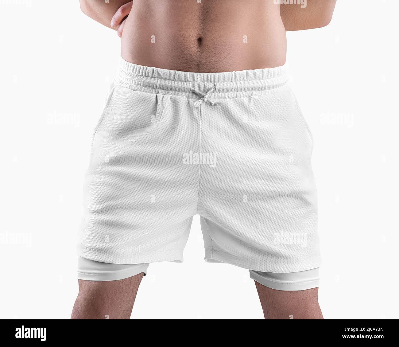 Chándal de pantalones cortos blancos sueltos con una línea compresión de pantalones bajos, lazos en la cintura, ropa deportiva para un hombre, aislado en el fondo. Subshor de textura Fotografía de
