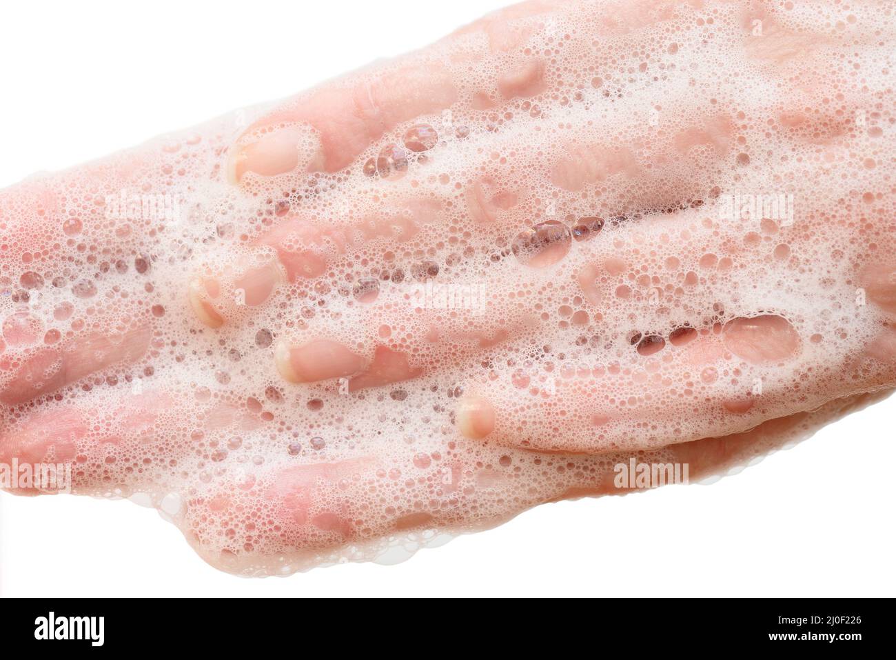 Jabón antibacteriano en las manos. Desinfección de manos con jabón. Limpieza e higiene en la vida cotidiana. Higiene de manos Foto de stock