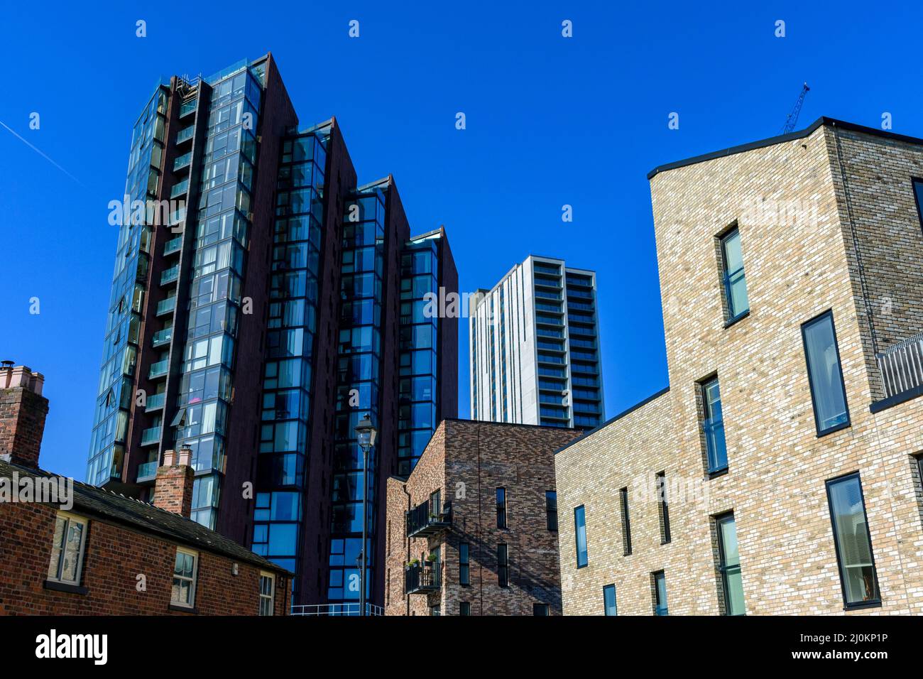 Los bloques de apartamentos de Islington Wharf, Islington Wharf Mews y Oxygen Tower, New Islington, Ancoats, Manchester, Inglaterra, REINO UNIDO Foto de stock