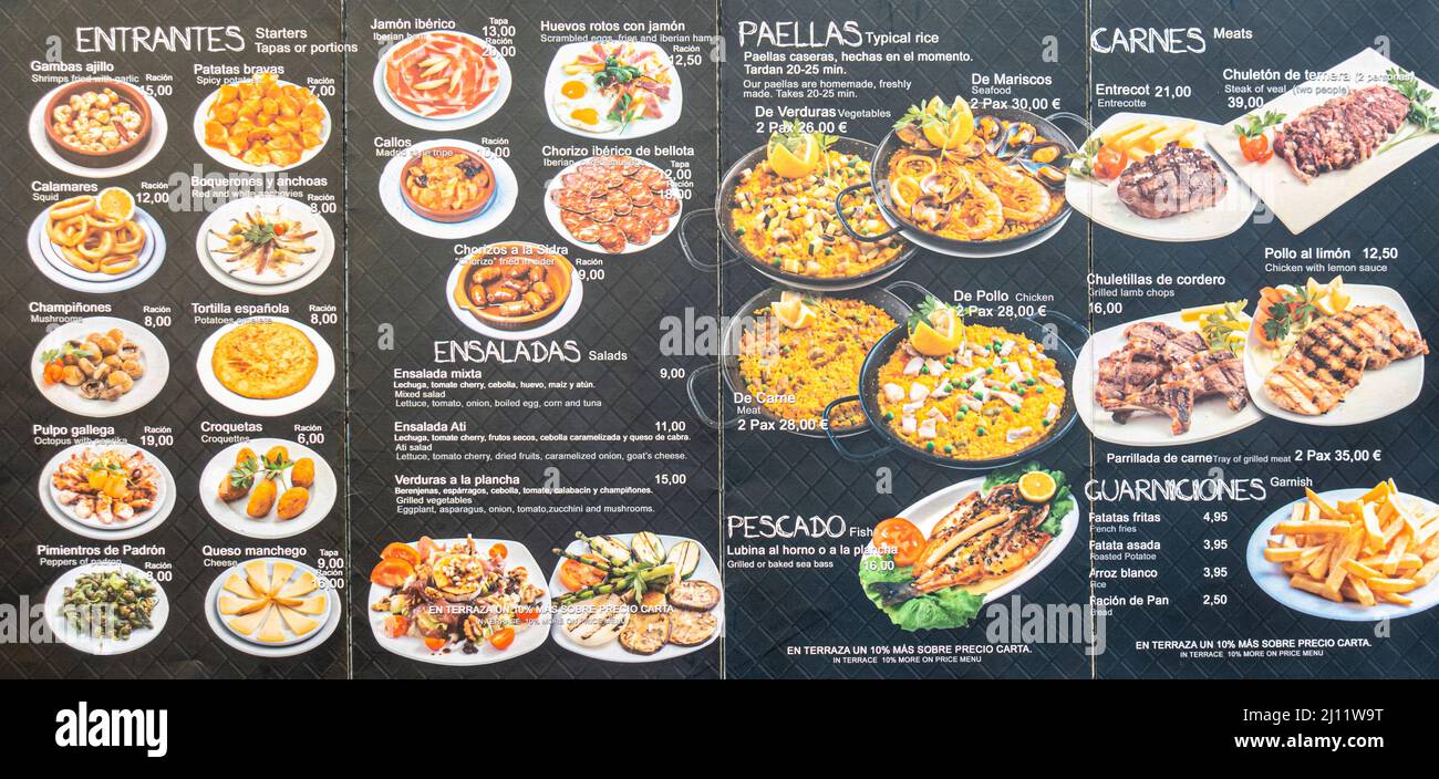Tapas paellas carnes menú comida callejera Madrid, España Fotografía de