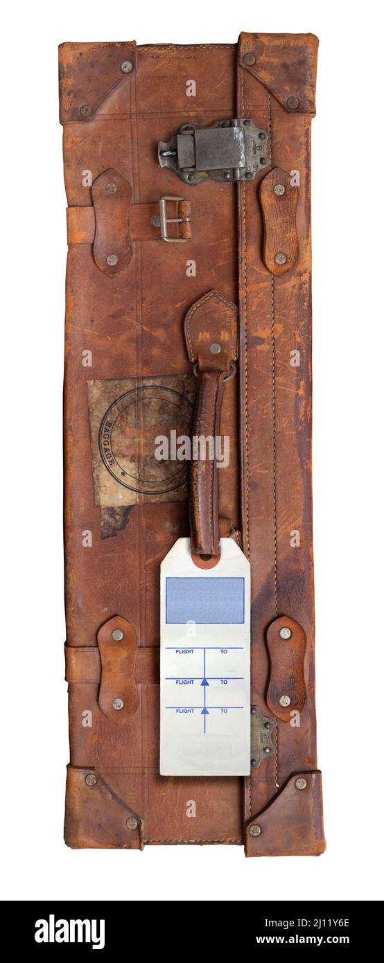 Retro Vintage Old Brown Suitcase con una etiqueta o etiqueta de equipaje en blanco, aislado sobre un fondo blanco Foto de stock