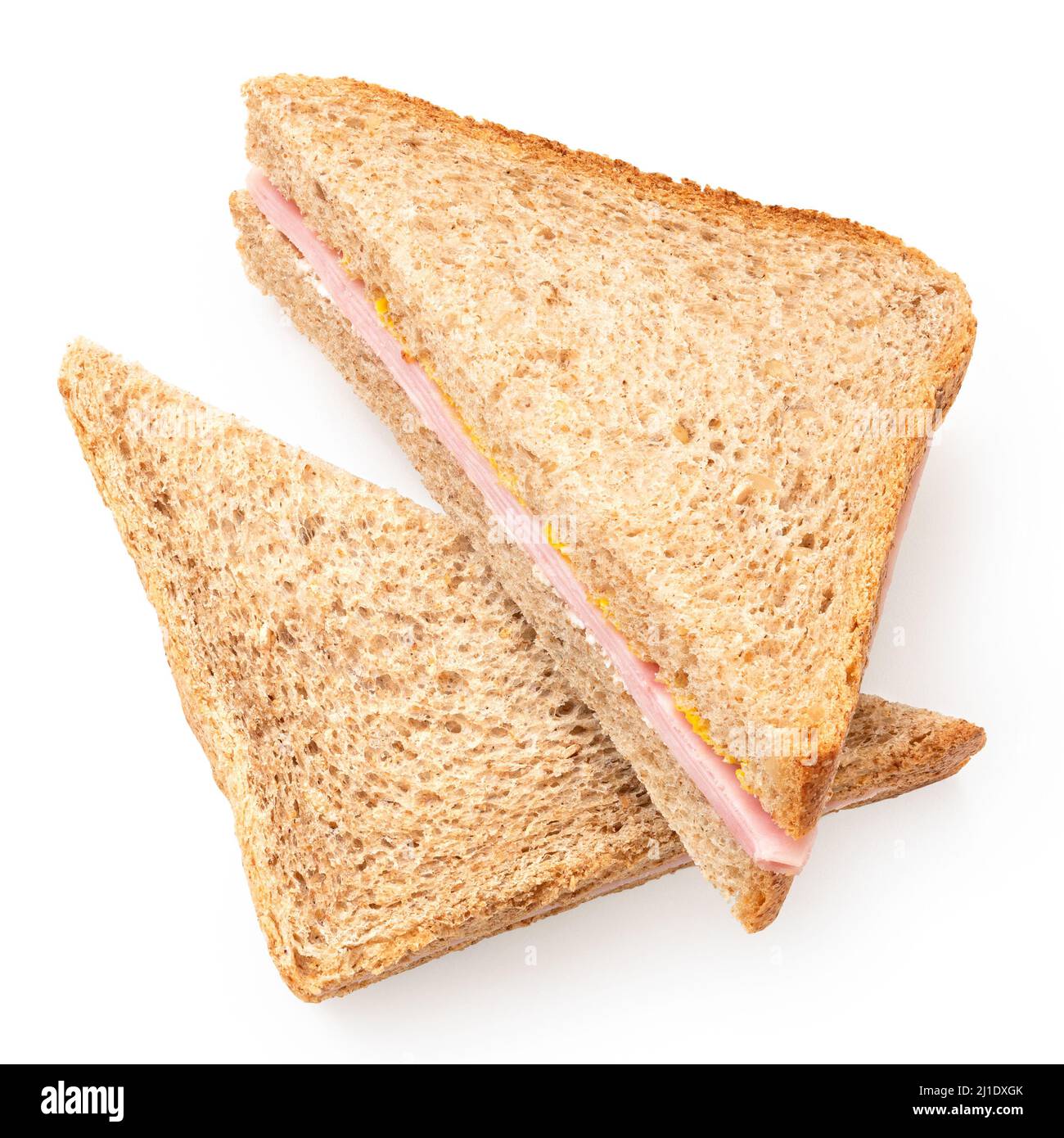 Dos sándwiches de triángulo de trigo integral de jamón y mostaza aislados sobre blanco. Vista superior. Foto de stock