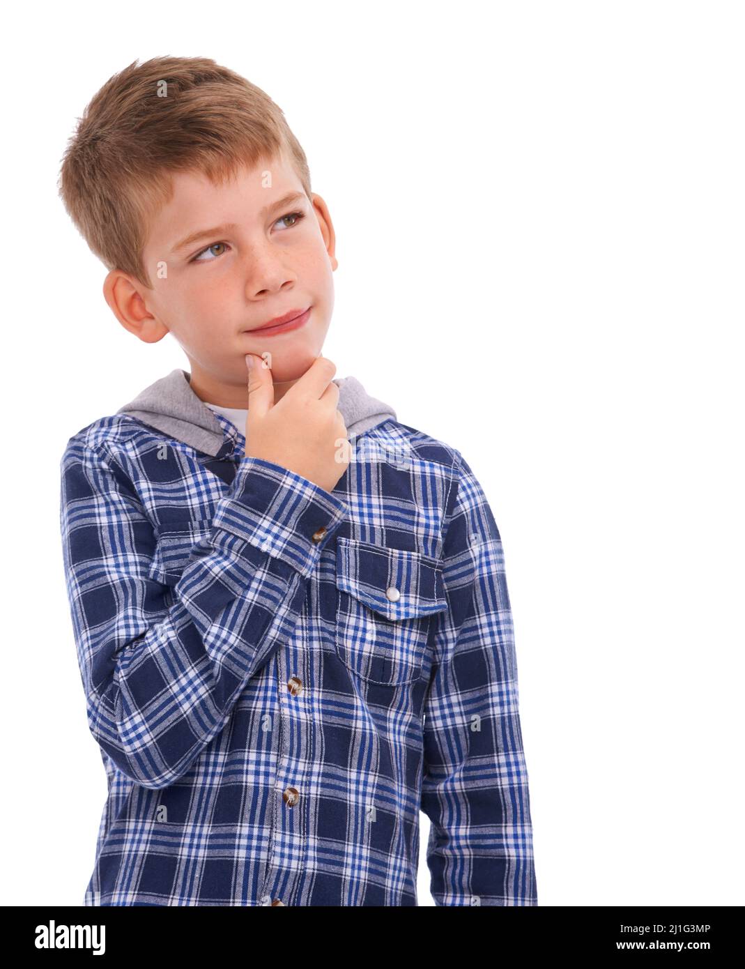 Va a crecer. Estudio de un niño vestido casualmente aislado sobre blanco. Foto de stock