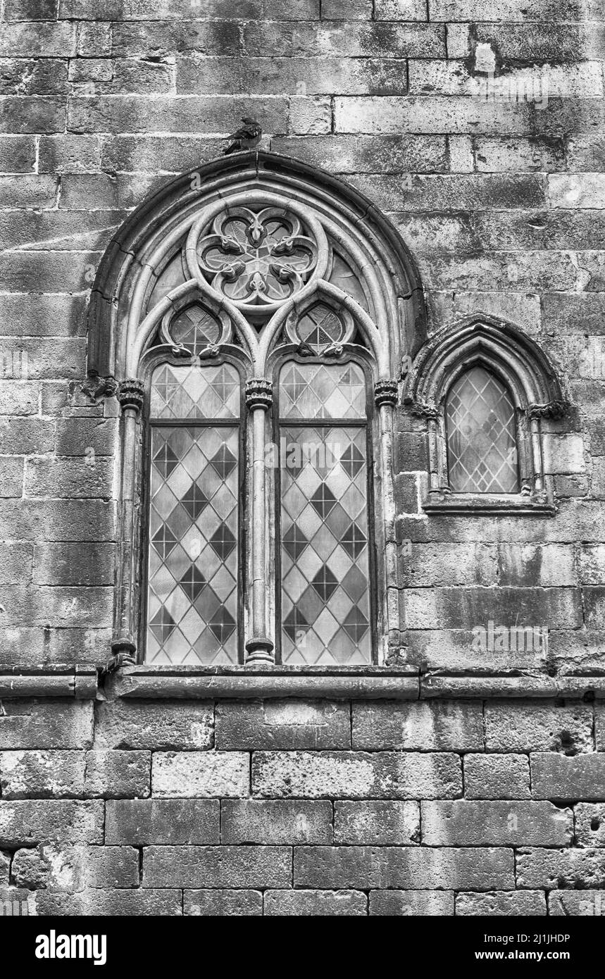 Ventana medieval de Palau Reial Major en la Plaça del Rei, la plaza pública del Barrio Gótico de Barcelona, Cataluña, España Foto de stock