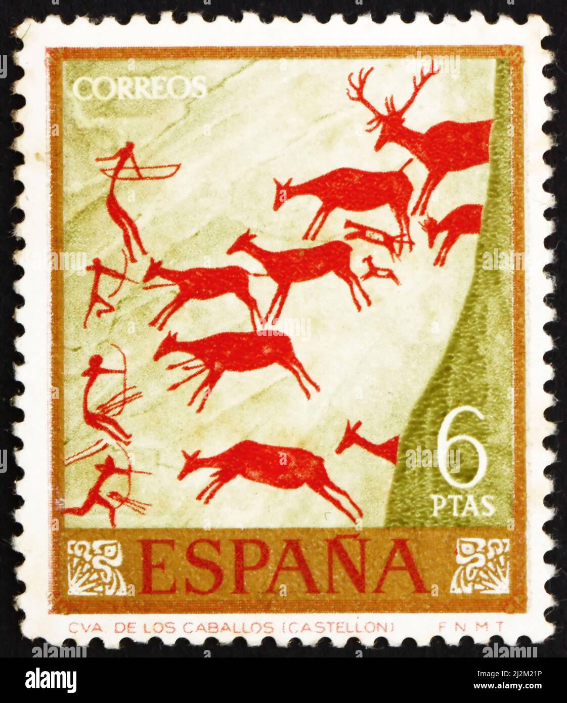 ESPAÑA - ALREDEDOR de 1962: Un sello impreso en España muestra Hunters and Deer Herd, Wall Painting encontrado en la Cueva Española, alrededor de 1962 Foto de stock