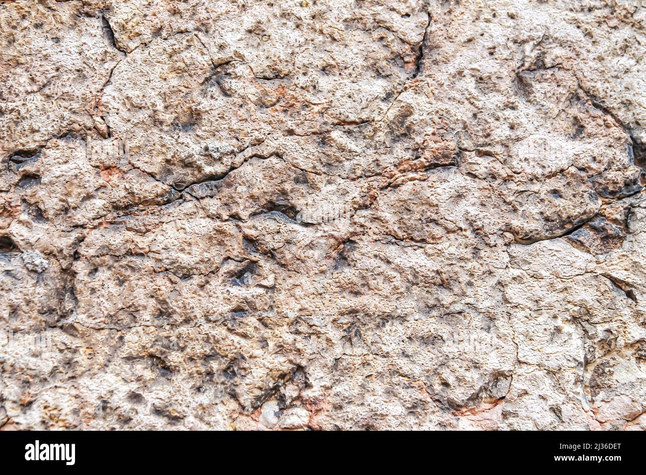 Fondo claro de piedra caliza natural. Textura de piedra natural con
