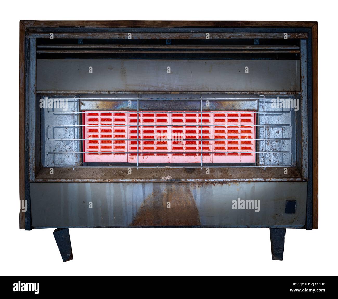 Vidrio Grungy aislado Fuego de gas interior antiguo o radiador o calentador mientras está encendido Foto de stock