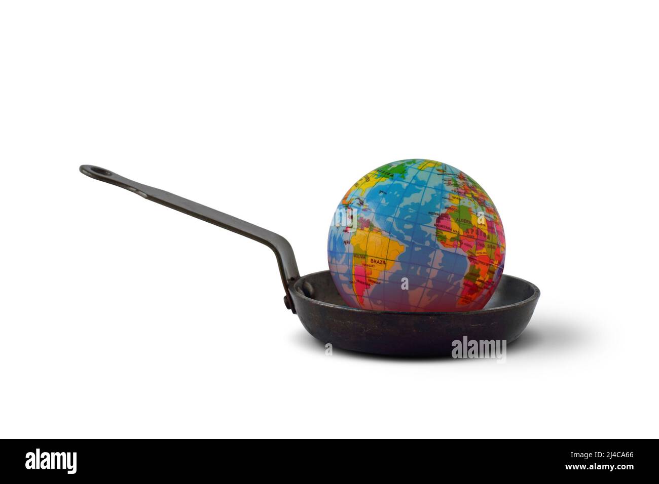 Planeta Tierra en una sartén - Concepto de calentamiento global Foto de stock