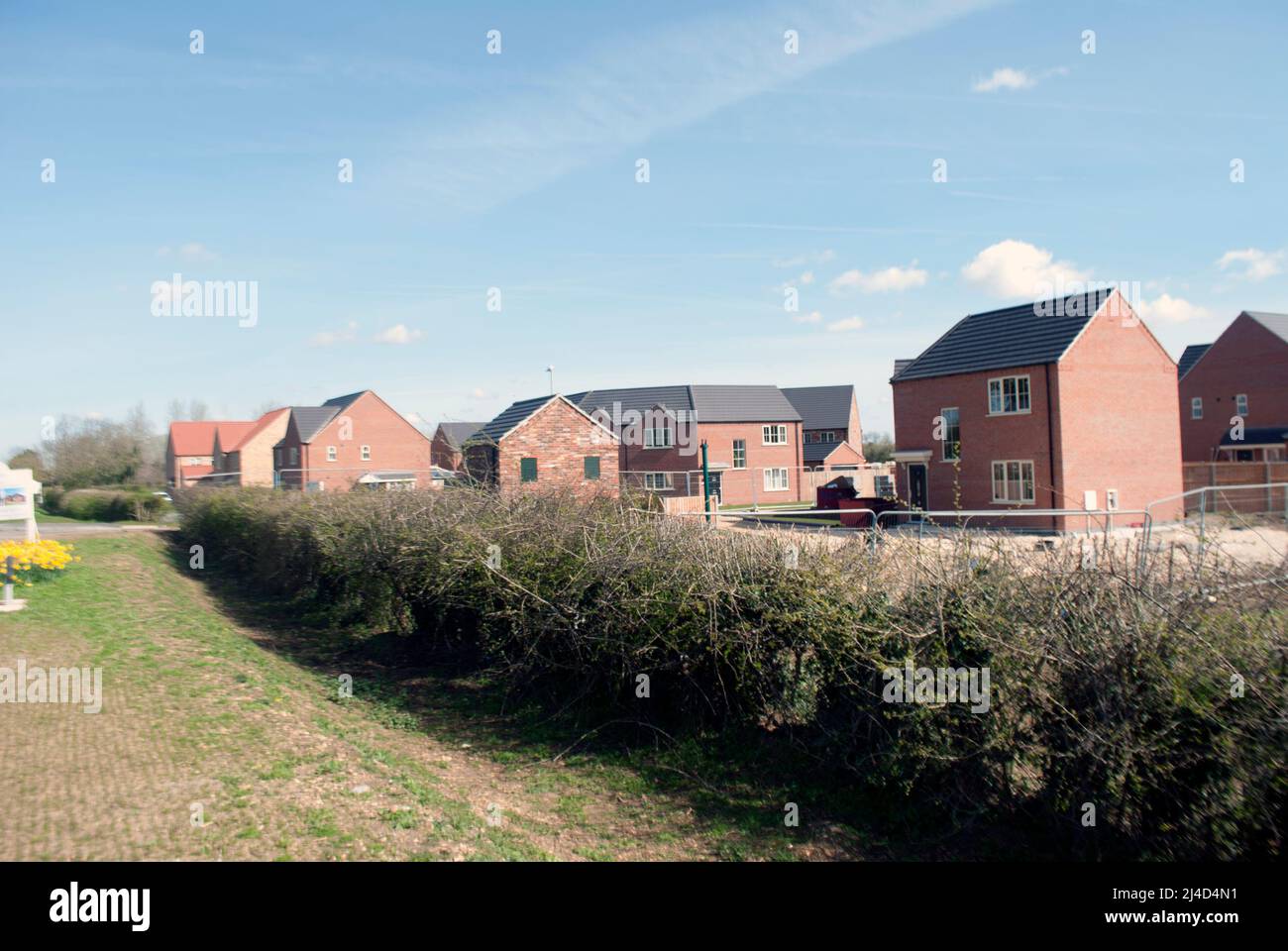 Nueva construcción de viviendas en el borde de la aldea Ruskington, Sleaford, Lincolnshire, Inglaterra, Reino Unido Foto de stock