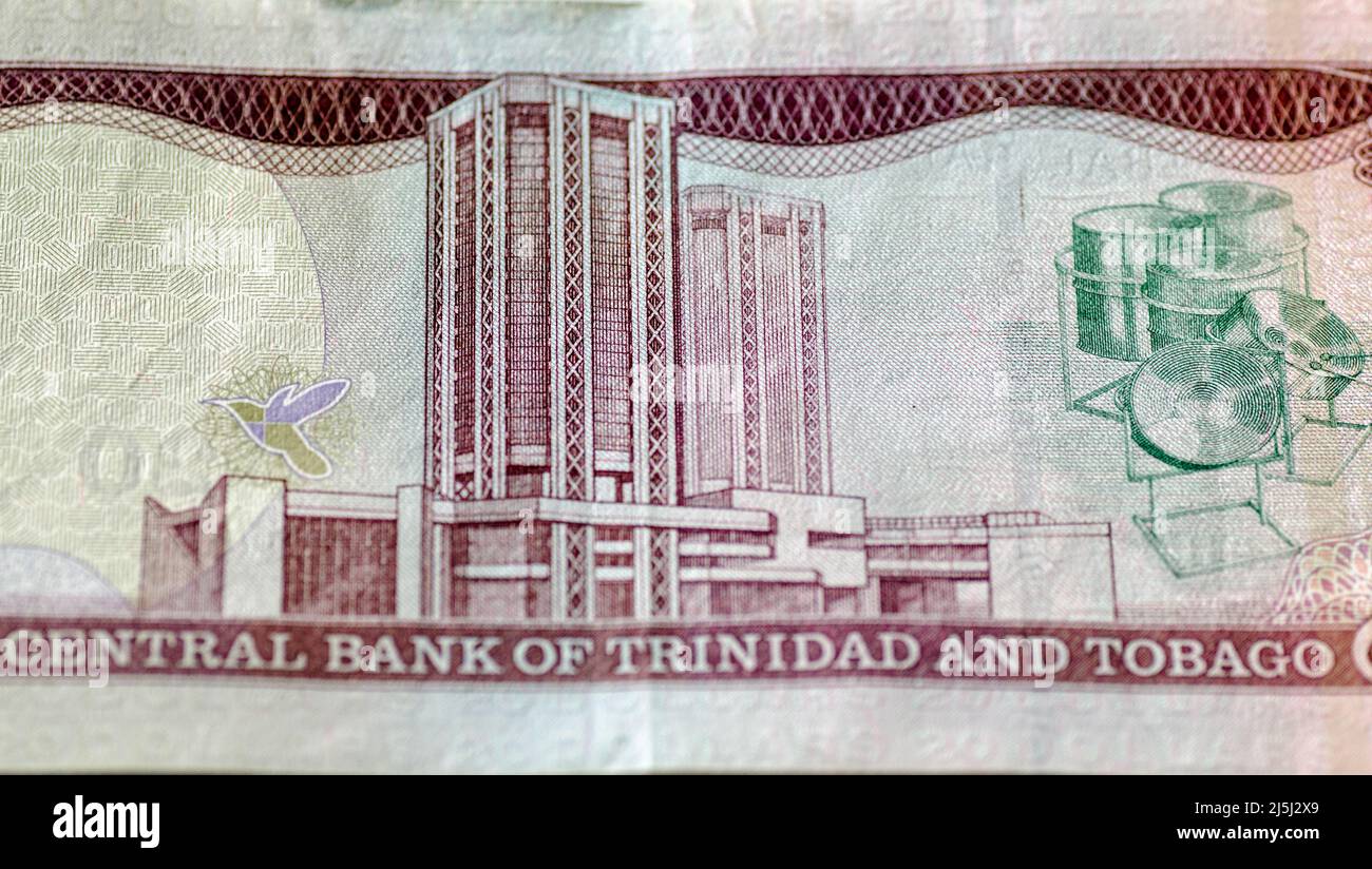 Detalle de un billete de veinte dólares de Trinidad y Tobago que muestra el Eric Williams Finance Plaza en Puerto España. Los edificios son dos de los Foto de stock