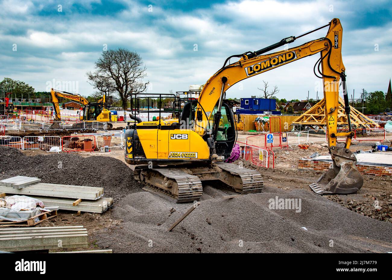 Un digger JCB en un sitio de construcción, Longridge, Preston, Lancashire, Reino Unido. Foto de stock
