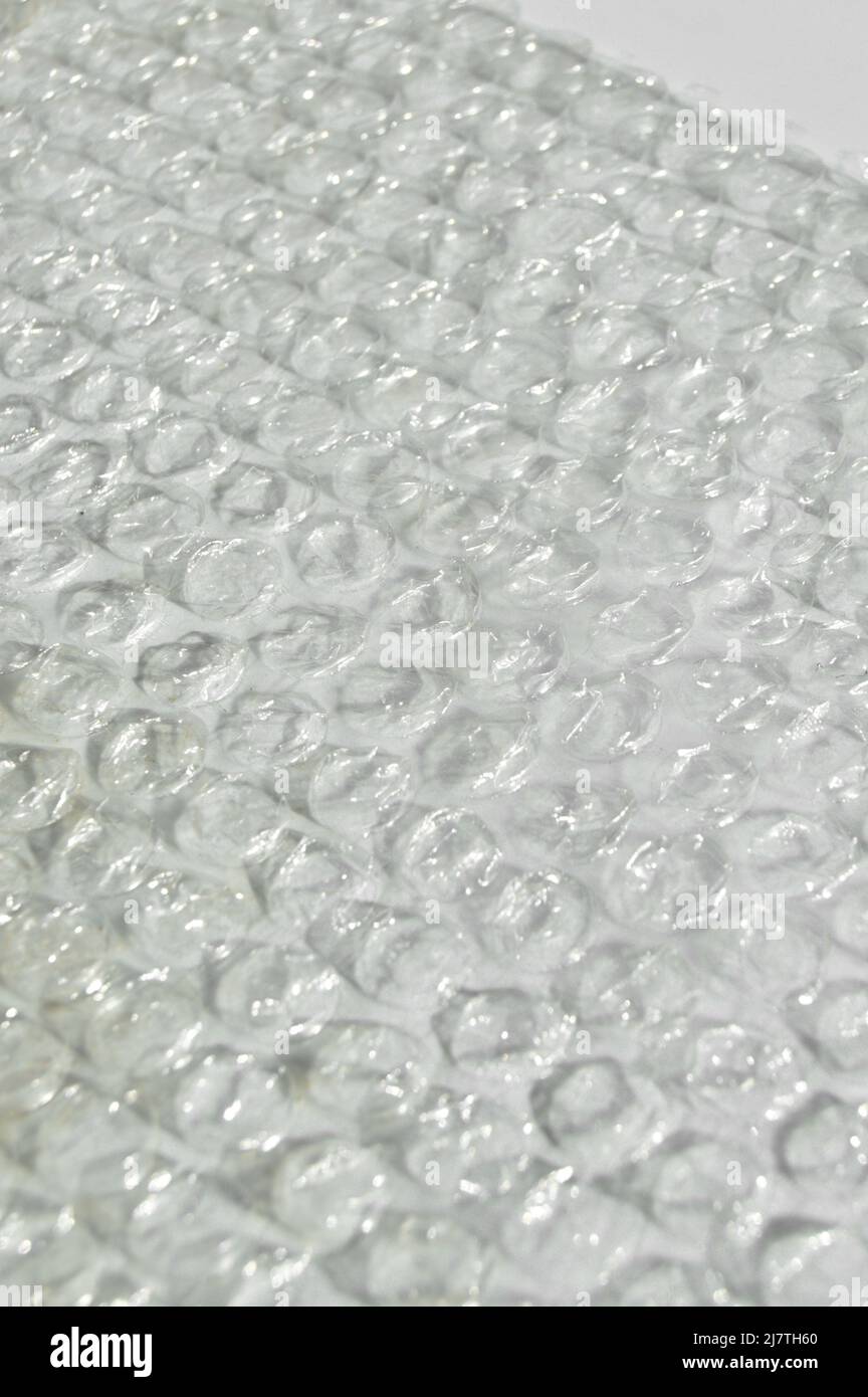 Plástico de protección de burbujas de aire papel de aluminio envolver  textura fondo, burbujas de aire embalaje textura Fotografía de stock - Alamy