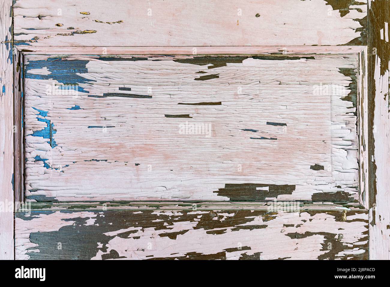 Panel de puerta de madera envejecida con fondo de pintura descascarada Foto de stock