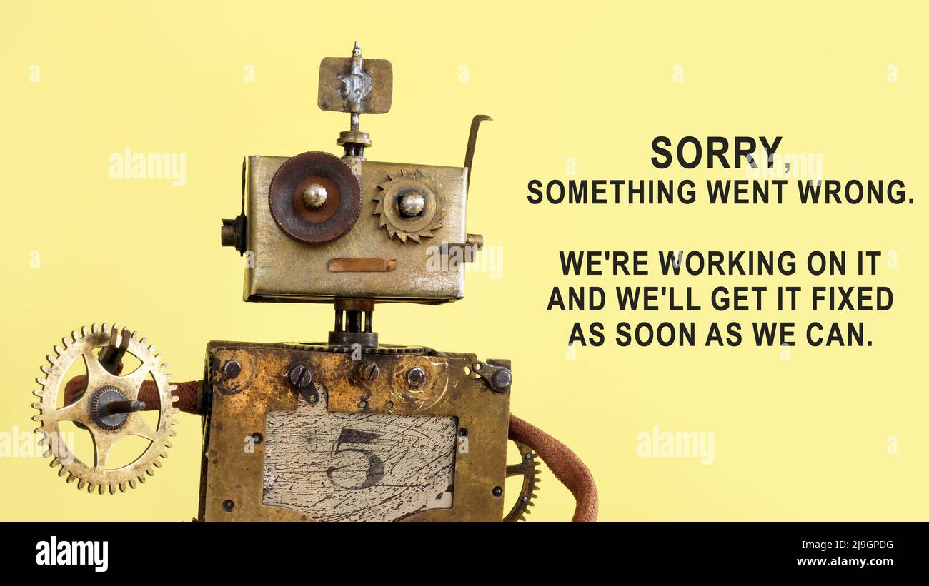 El robot sujeta una rueda dentada. Página divertida 404. Foto de stock