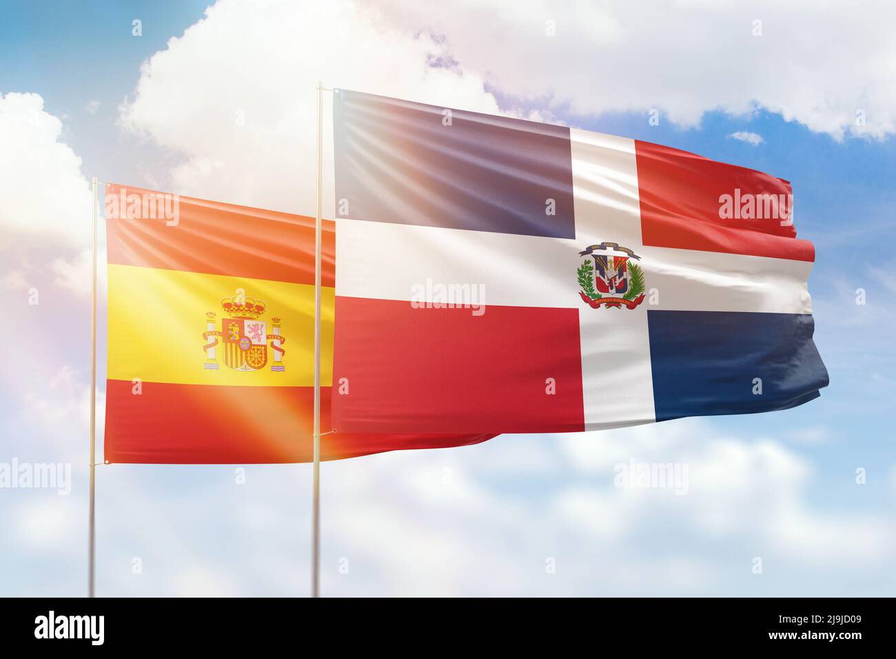 Cielo azul soleado y banderas de la república dominicana y españa  Fotografía de stock - Alamy