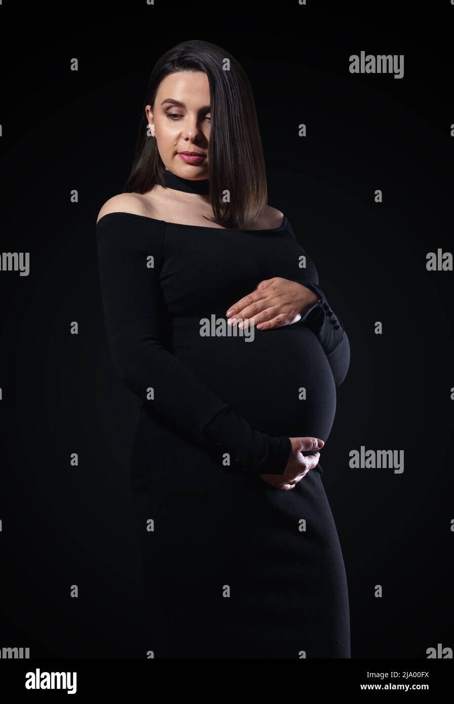helicóptero probabilidad el último Vestido de maternidad negro fotografías e imágenes de alta resolución -  Alamy