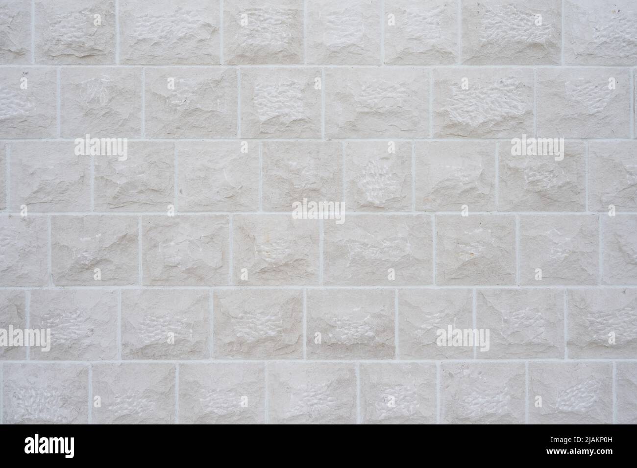 Textura de pared de piedra beige, decoración de pared de piedra. Foto de stock