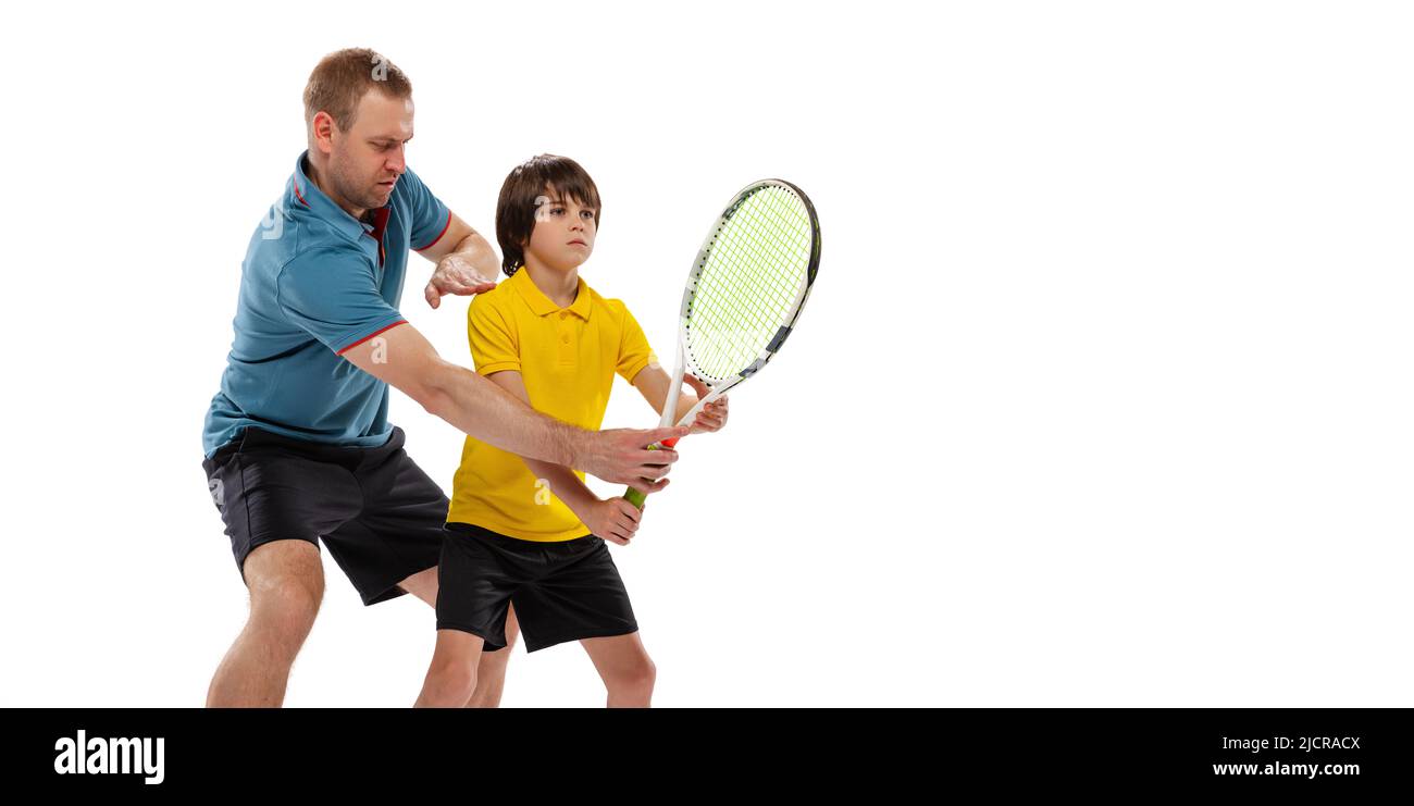 Boy playing tennis junior player Im genes recortadas de stock Alamy