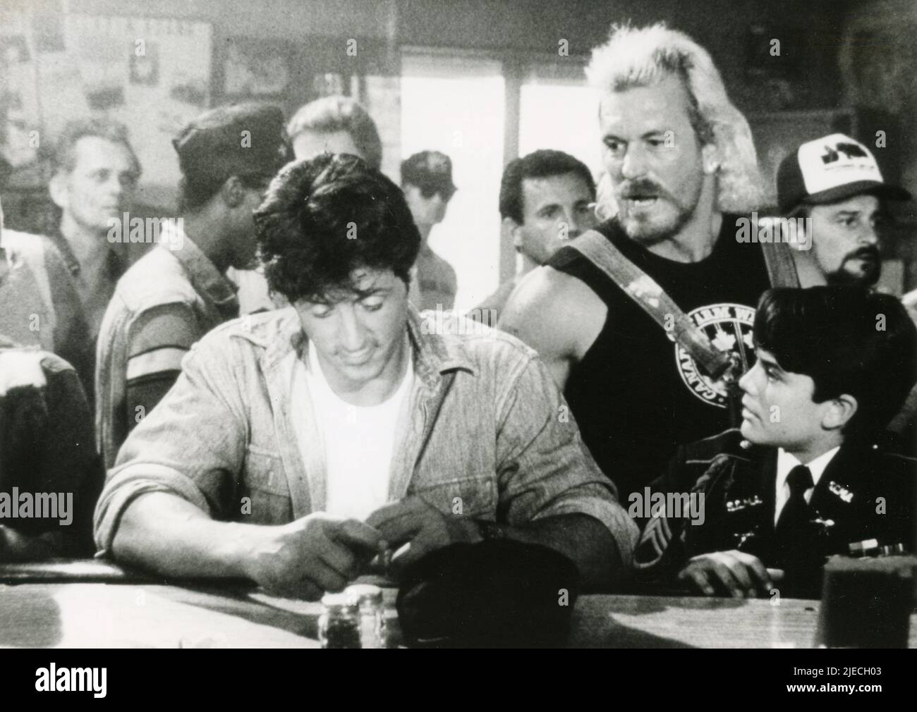 El actor Sylvester Stallone y el actor infantil David Mendenhall en la película Over the Top, USA 1987 Foto de stock