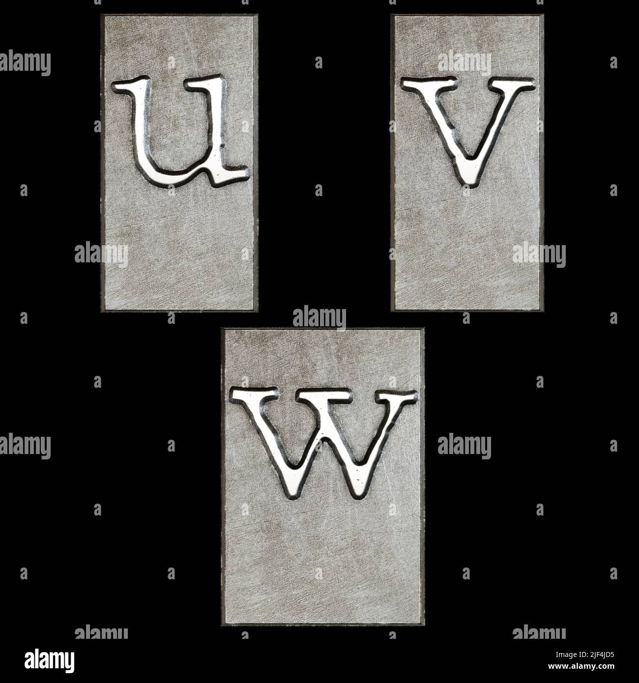 3D Renderización del alfabeto del cabezal de impresión de máquina de escribir de metal - letras minúsculas u-w Foto de stock
