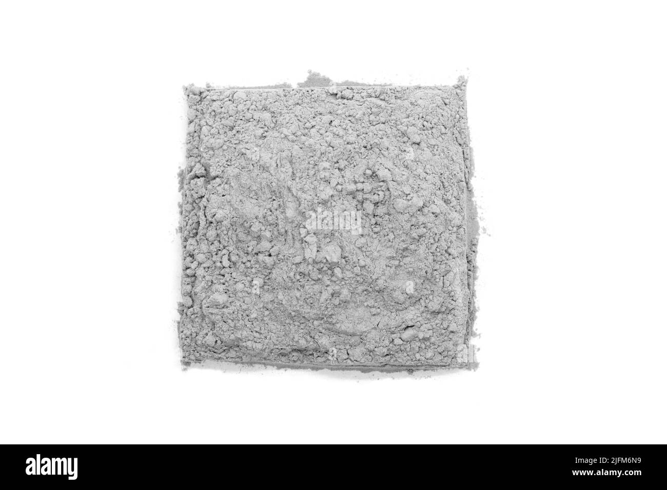 Polvo de arcilla cosmética gris cuadrada - vista superior Foto de stock