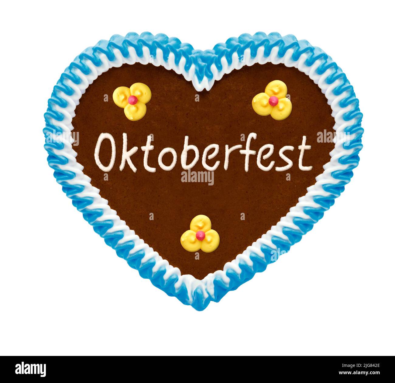 Pan de jengibre corazón de Oktoberfest aislado sobre fondo blanco Foto de stock
