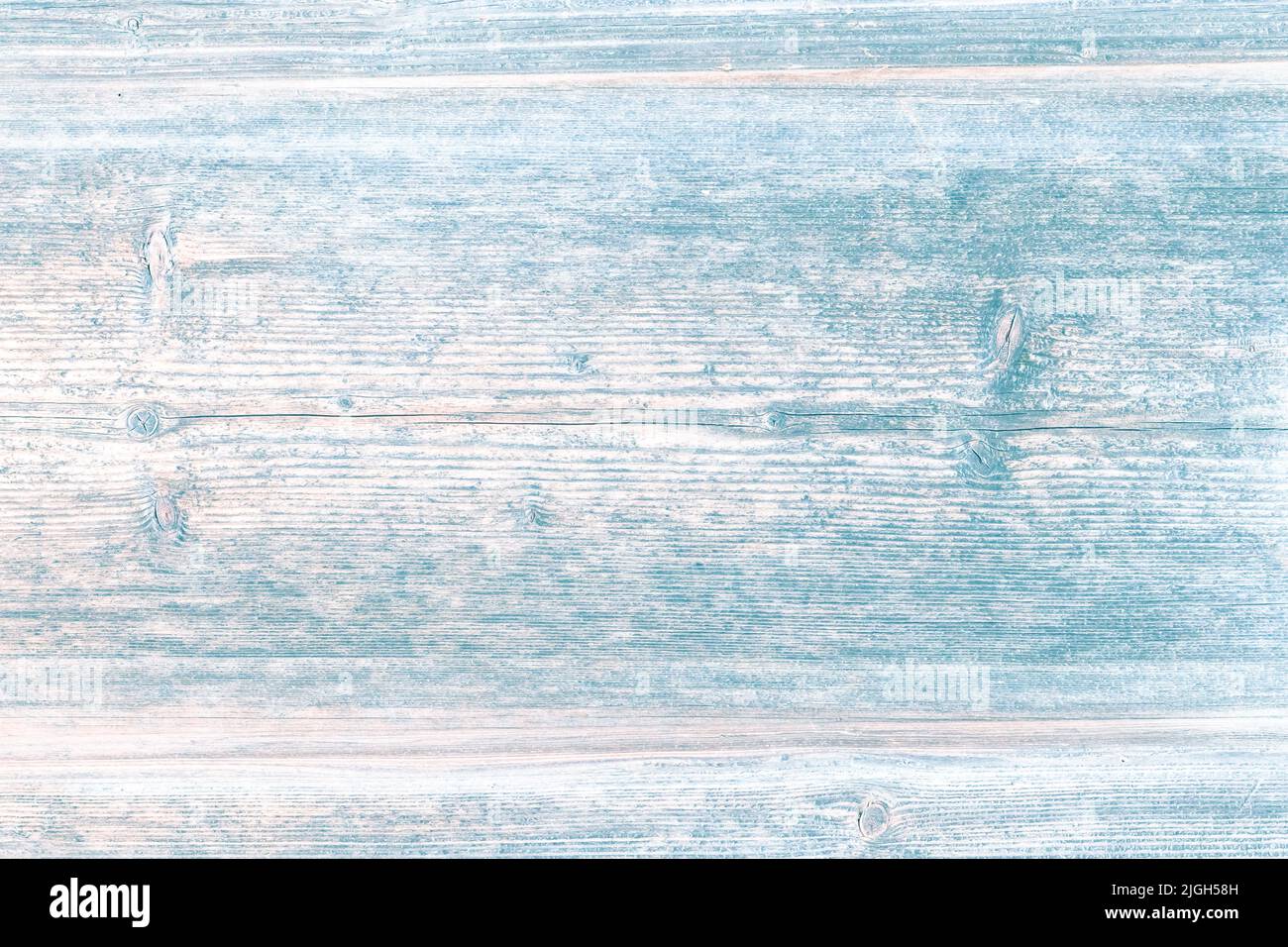 Mesa de madera turquesa, fondo con textura de madera, tablero antiguo de época. Vista de la parte superior de la mesa de color azulado desgastado. Escritorio agrietado de color claro Foto de stock