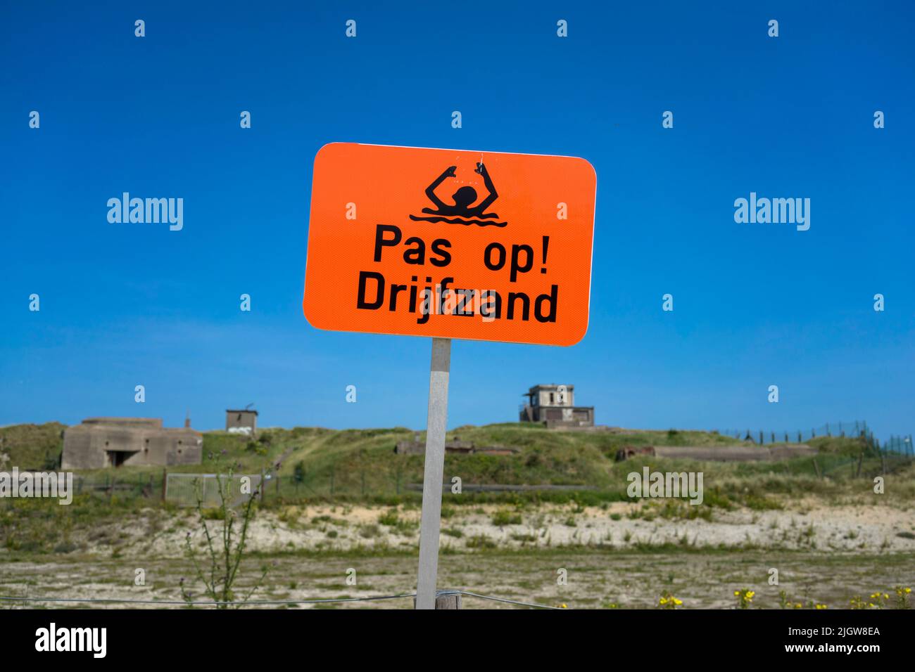 Señal de advertencia de arena movediza en Ostende/Bélgica Foto de stock