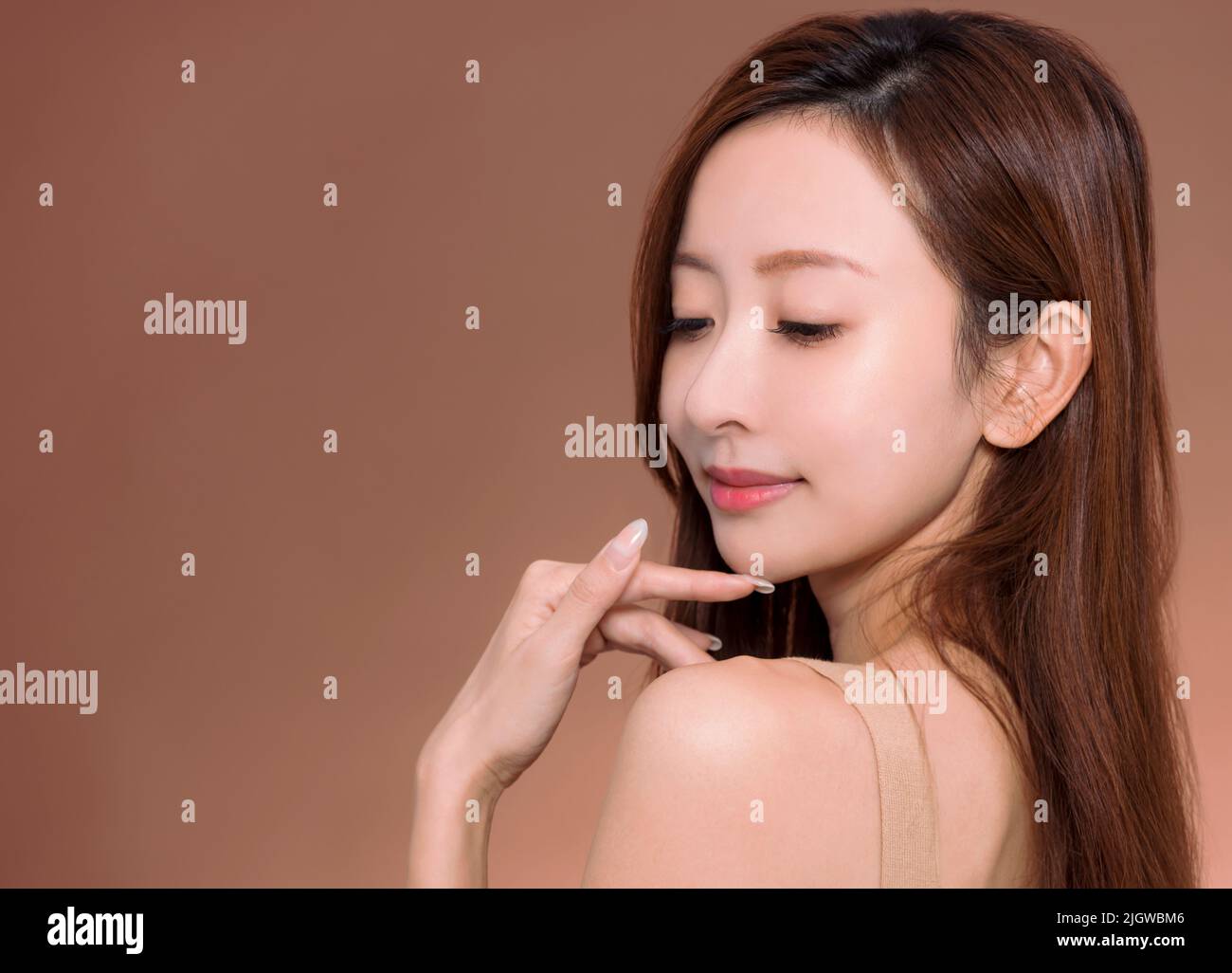 Cara joven de la belleza asiática con la piel limpia sana Foto de stock