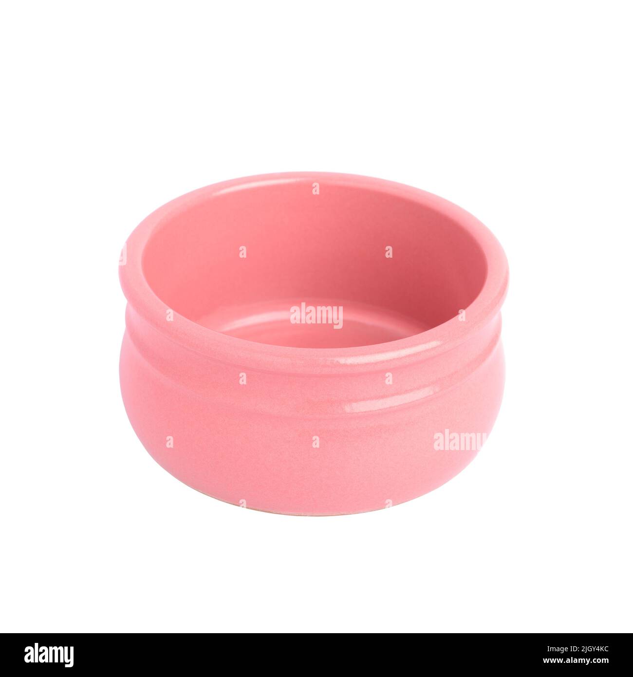 Recipiente de cerámica rosa vacío aislado sobre fondo blanco primer plano, poca profundidad de campo Foto de stock