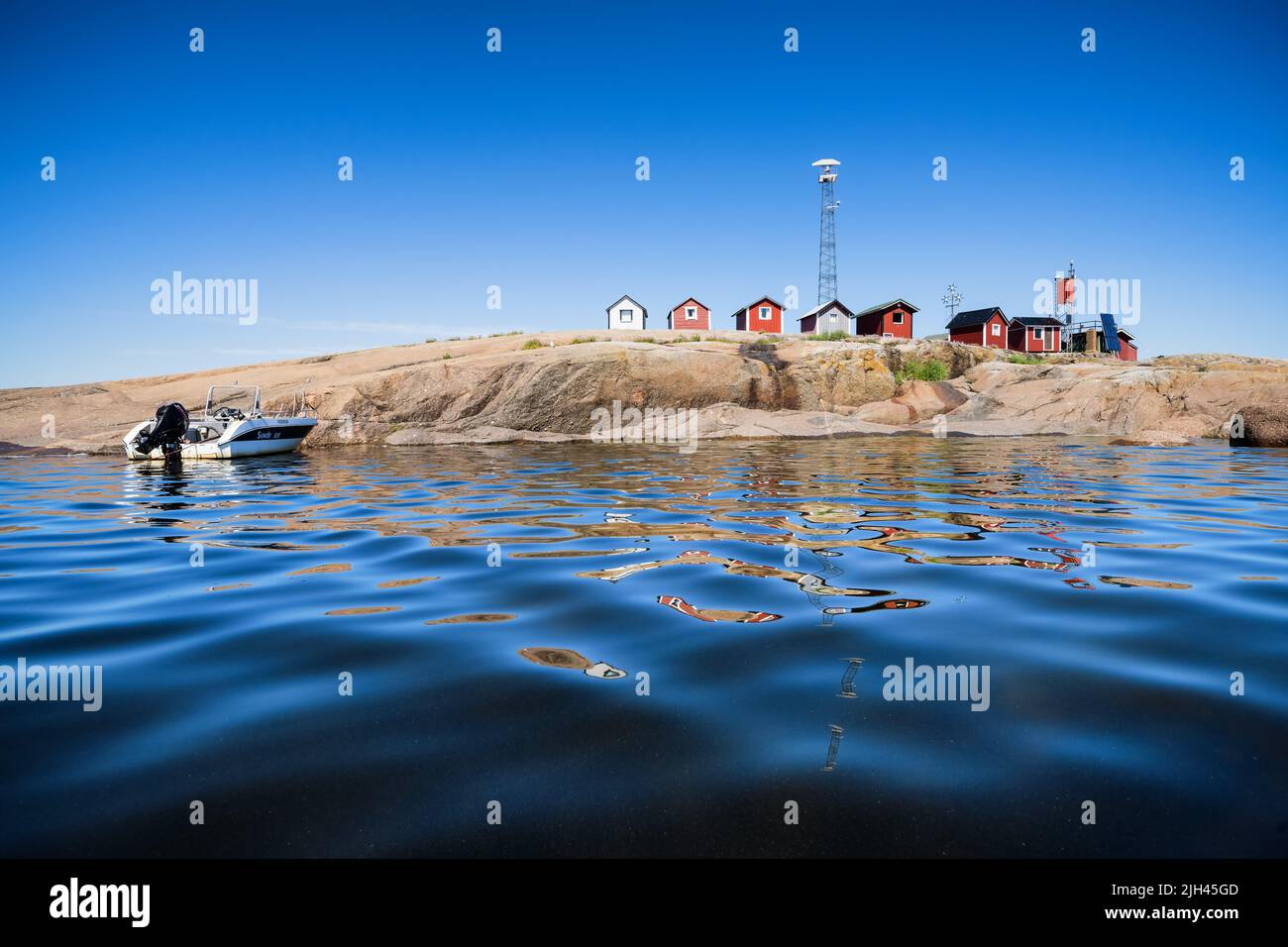Pequeñas cabañas en la isla de Huovari, Virolahti, Finlandia Foto de stock