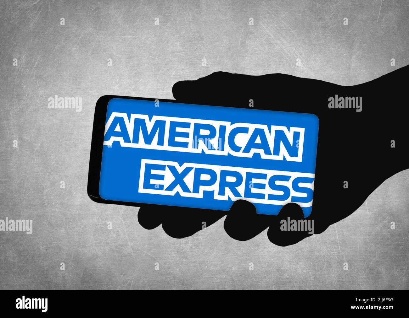 Logotipo de la empresa de American Express en el dispositivo móvil Foto de stock